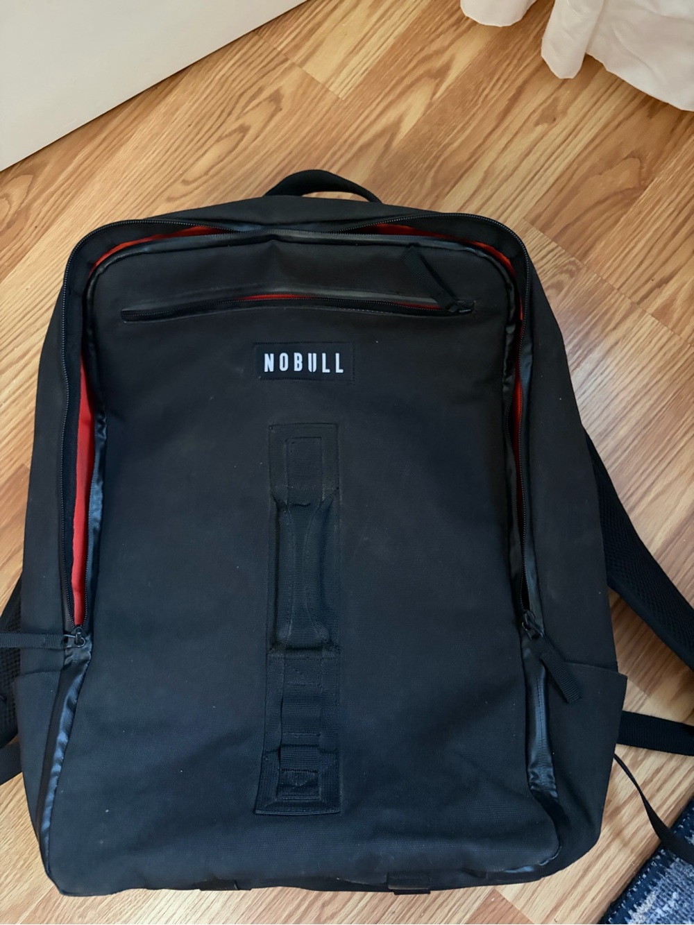 NOBULL Black Backpack with Red Interior Accents